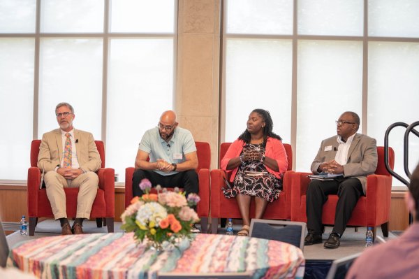 From left are Mark Schaub, Louis Moore, Ta'les Love and Dwayne Tunstall, participating in a panel discussion during the Quest Series on June 19.