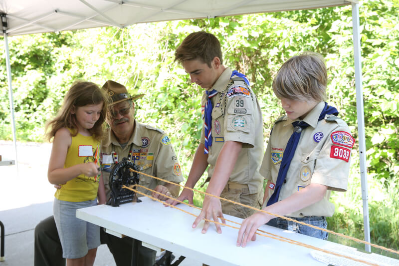Local Boy Scouts taught participants how to make rope.