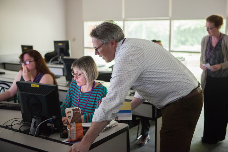 Peter Anderson, Classics Department chair, facilitating a workshop about an online development tool for studying ancient texts.