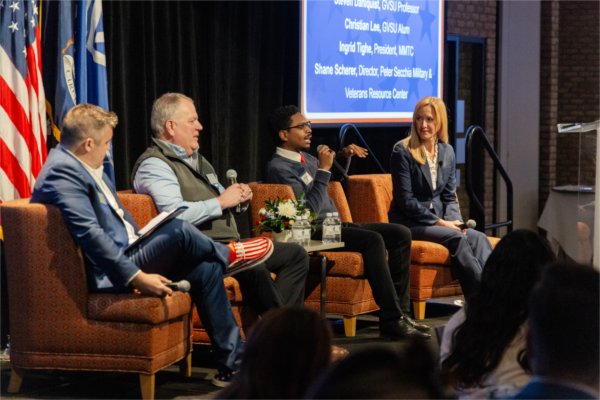 Tighe also joined Scherer and other veterans on a panel, where they discussed adjusting to life outside the military, what they learned while serving, and other topics connecting their lives from their service to where they are today.