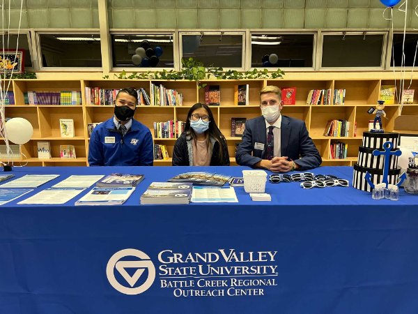 From left are Michael Guerra, admissions counselor, Monica Mawi (Lakeview High School student and T4 Scholar) and Matthew Bozzo.