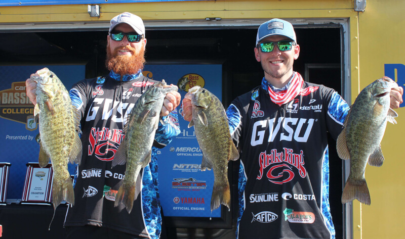 A photo of Lucas Murphy and Nolan Hitt holding their trophies. 