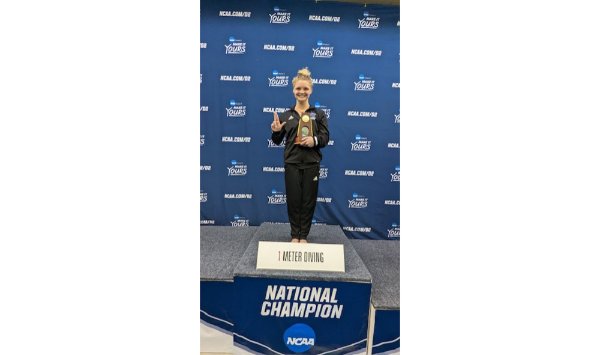 Gracyn Segard poses for photo after winning 1-meter diving national championship