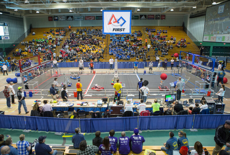 A photo of a past FIRST Robotics competition.