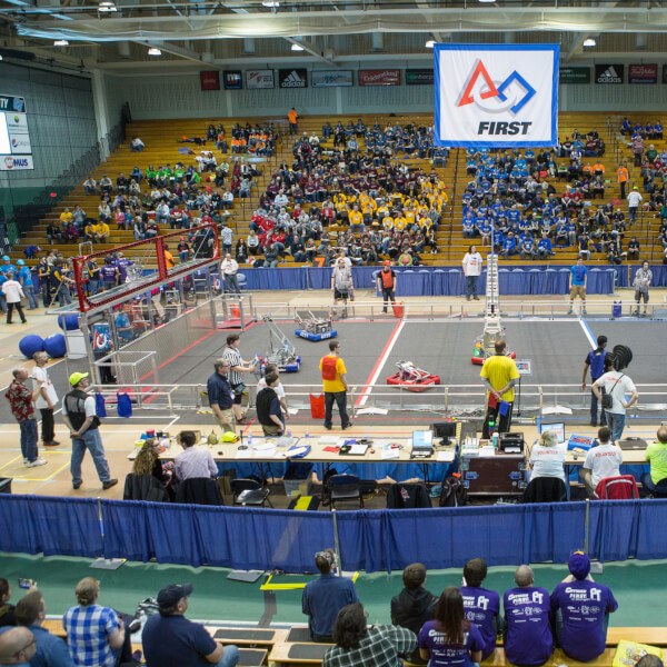 A photo of a past FIRST Robotics competition.