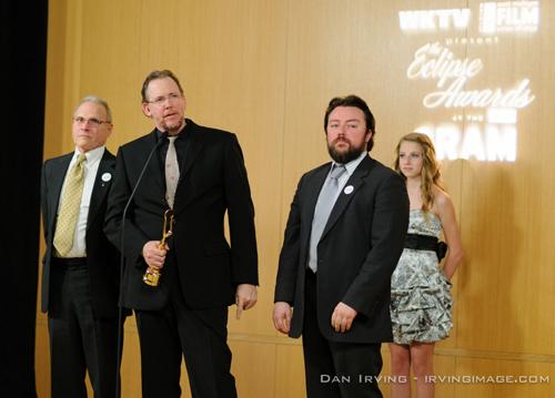 Left to right, School of Communications faculty members Joseph McCargar (sound designer), and John Harper Philbin (director) are joined by actor Michael McCallum to accept the Eclipse Award for their film �Message Sent.�
