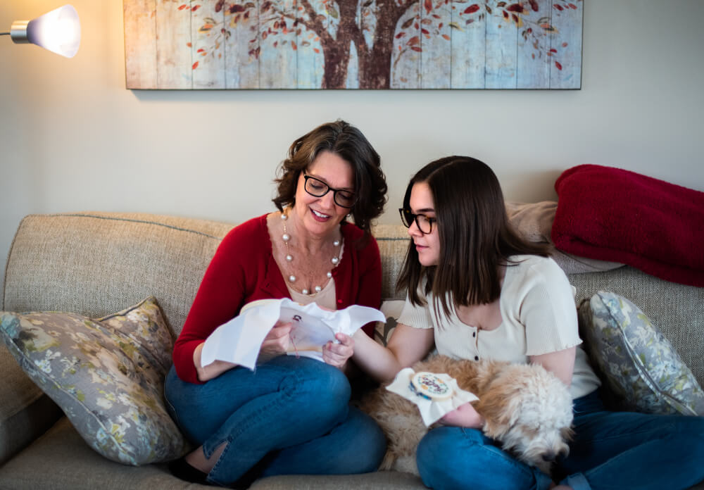 Kathy Hunter, a psychiatric mental health nurse practitioner (PMHNP) for GVSU's Counseling Center, is pictured crafting with her daughter, Abby Schneider. 