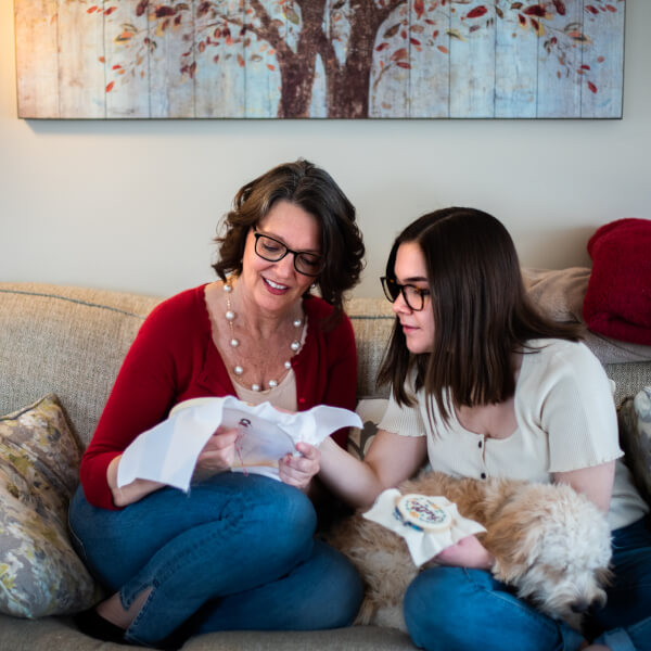 Kathy Hunter, a psychiatric mental health nurse practitioner (PMHNP) for GVSU's Counseling Center, is pictured crafting with her daughter, Abby Schneider. 