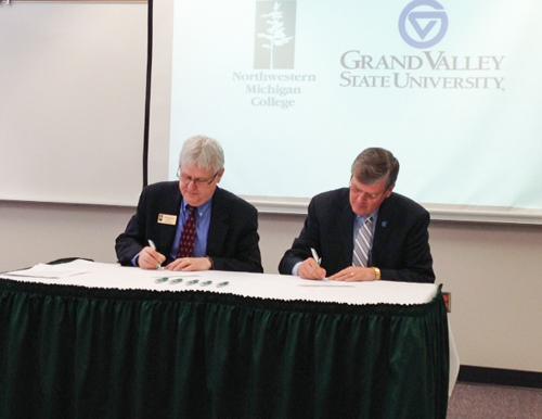 President Haas, right, recently signed a transfer agreement with Timothy Nelson, president of Northwestern Michigan College