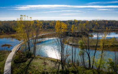 A bridge over a small body of water at Millenium Park 