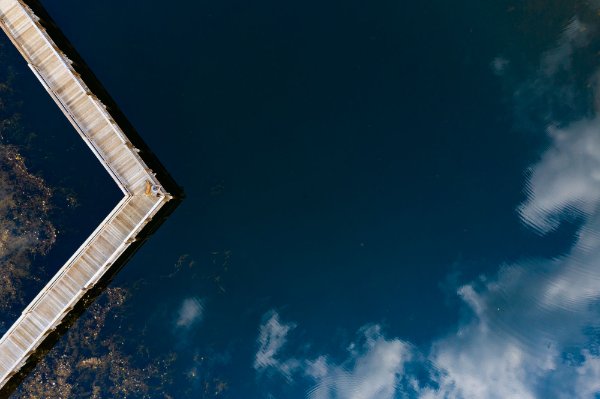 Blue water with a bridge