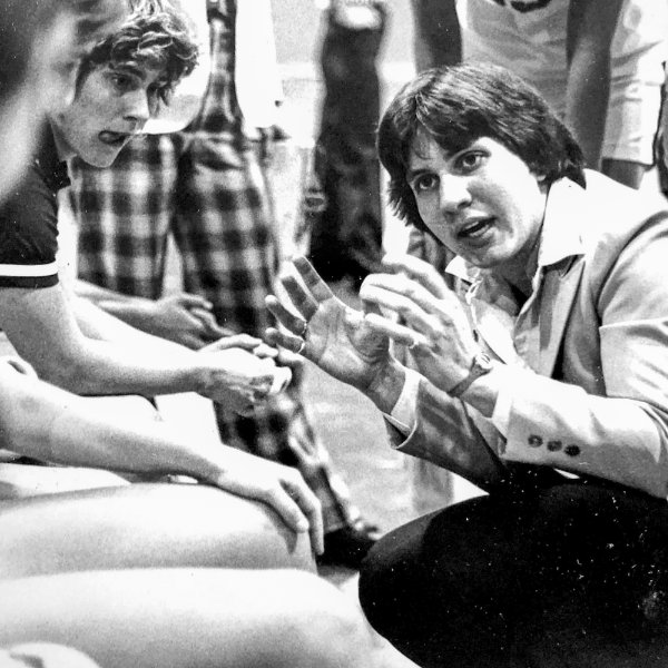 Former basketball coach Pat Baker-Grzyb talks with her players.