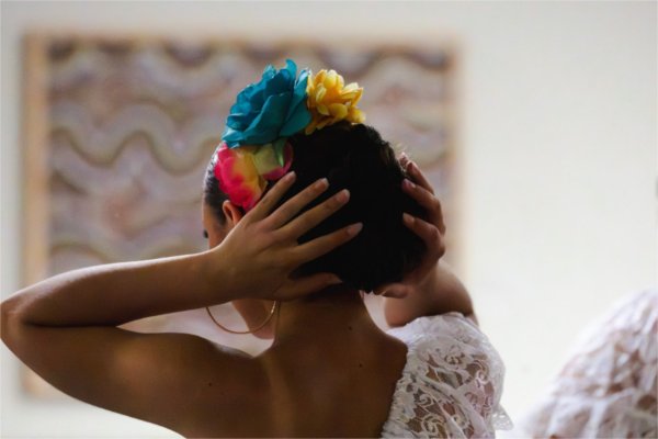 Monarcas dancers prepare to perform. 
