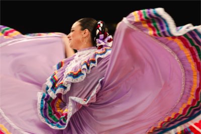 Dancers take the floor in ribbon dresses during Hispanic Heritage Celebration on October 9.