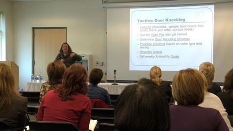 Participants take in part of the 'Ready to Run Michigan' workshop on Saturday afternoon.