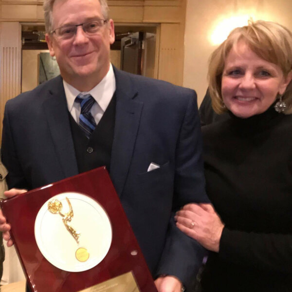 Jay Lowe, assistant general manager of WGVU Public Media, is pictured at the awards ceremony in Birmingham, Michigan, with his wife Colleen Lowe.