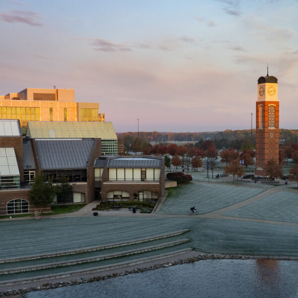 An aerial view of the pond near Kirkhof Center in the early winter. A light frost covers the ground. The shot is taken in the low light of the early morning.