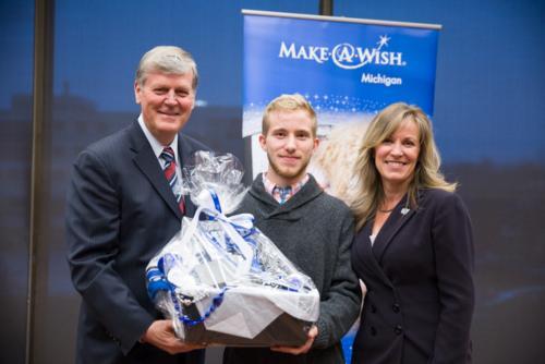 From left, President Thomas J. Haas, Randall Wallace and Renae Wallace. 