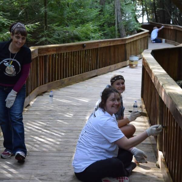 group staining wooden bridge