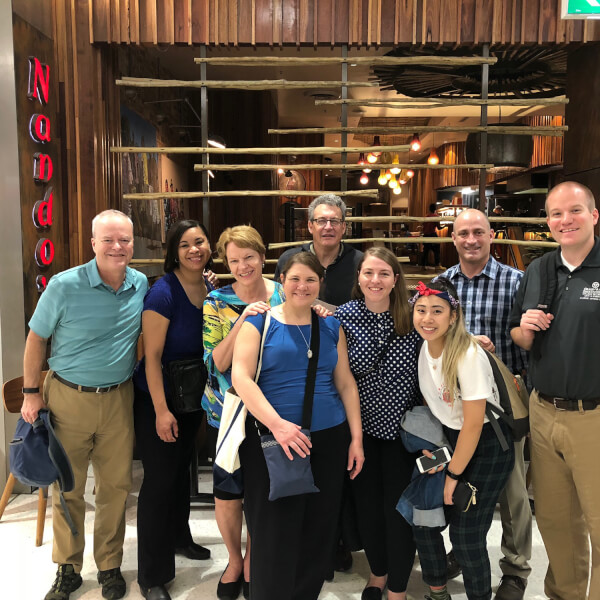 group of people in front of restaurant