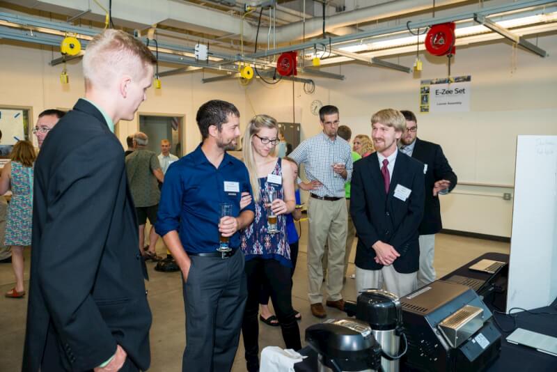  Students, alumni and representatives from local companies celebrate 30 years of co-op education.