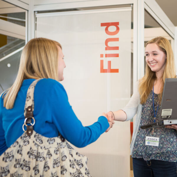 Students working at The Knowledge Market.