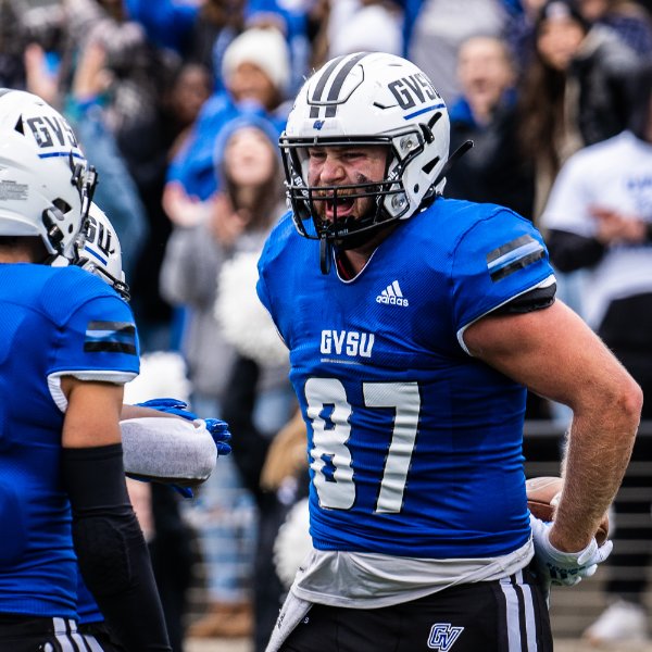 Grand Valley football player celebrates a play.