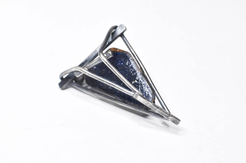 Photo of a pin designed and crafted commemorative pins for the attendees of the Conference for U.S. Women Governors.