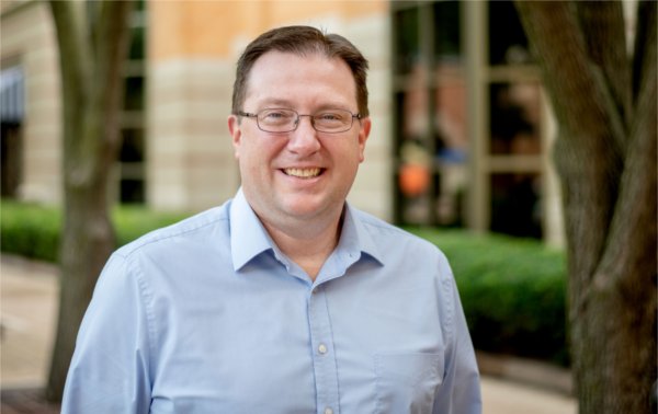 Neal Buckwalter, director of the Masters of Public Administration program, poses for a photo.