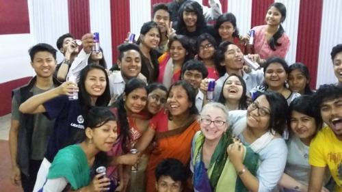 Karen Libman pictured with B. Borooah College students following the group's performance. 