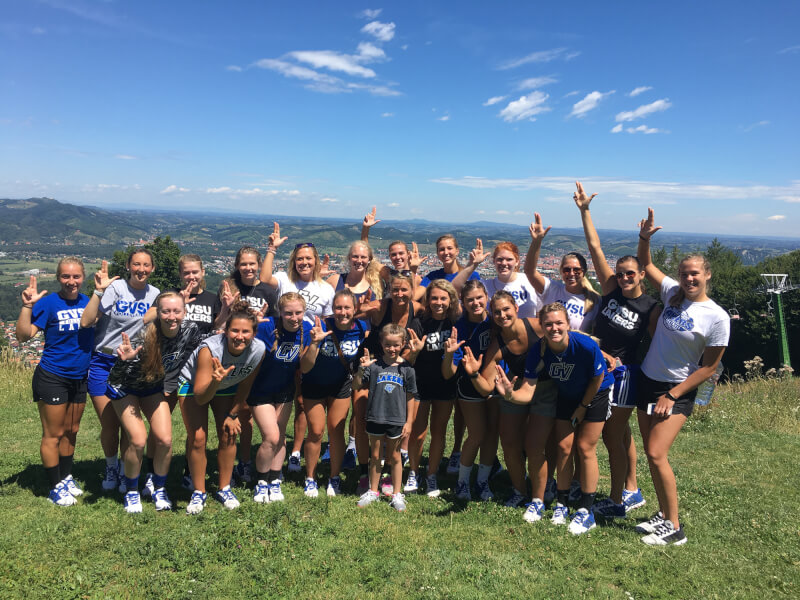 The GVSU Volleyball team poses for a picture in Slovenia.