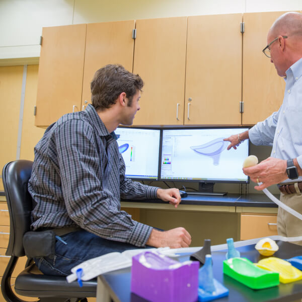 The aMDI team includes Kevin Weaver, left; Brent Nowak, right; and a team of graduate and undergraduate students.