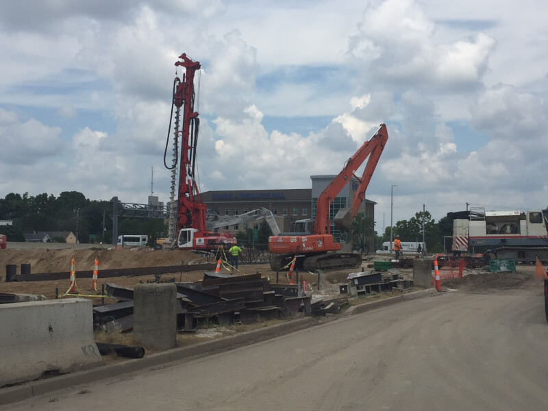 Construction of a six-level parking deck is underway on Michigan Street in downtown Grand Rapids.