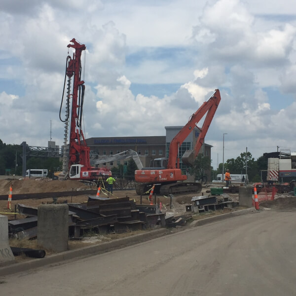 Construction of a six-level parking deck is underway on Michigan Street in downtown Grand Rapids.