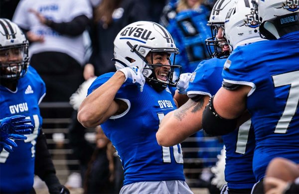GVSU football players celebrate during the 2021 homecoming game