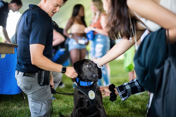 Officer Kelsey Sietsema and Koda, the GVPD K-9, visited with students on the Allendale Campus.