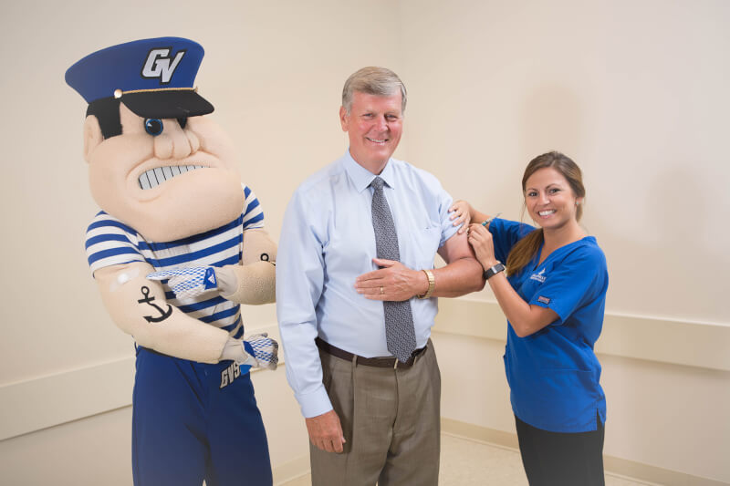 Louie the Laker, President Haas and nursing student
