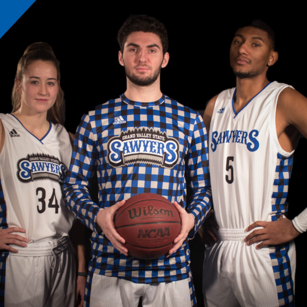 three basketball players