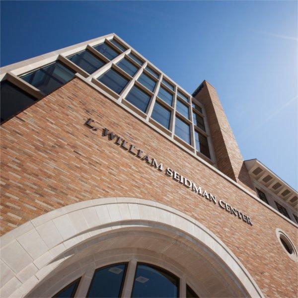Low angle photo of L. William Seidman Center's main entrance