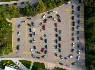 Cars wait in line during the first day of move-in on the Valley Campus on August 26.