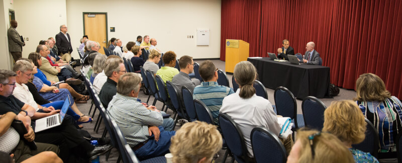 Henry Matthews, director of galleries and collections, comments during the open forum.