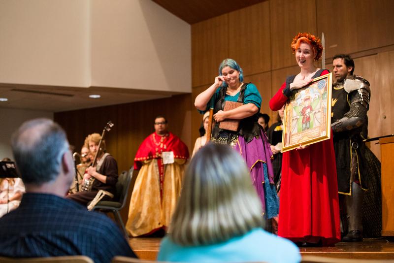 Haskin's friends presented his parents, Julie and Tim Haskin, with a watercolor portrait. The ceremony coincided with the start of Grand Valley's annual Renaissance Faire.