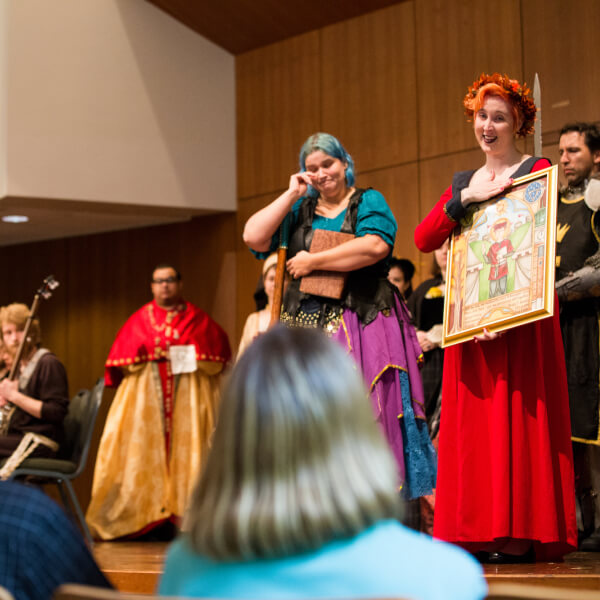 Haskin's friends presented his parents, Julie and Tim Haskin, with a watercolor portrait. The ceremony coincided with the start of Grand Valley's annual Renaissance Faire.