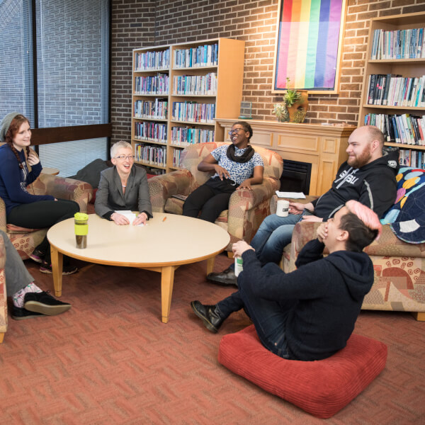 A photo of students and staff members at the Milton E. Ford LGBT Resource Center.