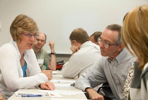 Faculty members are pictured at last year�s FTLC fall conference. This year's event is set for August 22.
