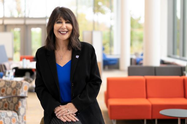 President Mantella sits in the Mary Idema Pew Library