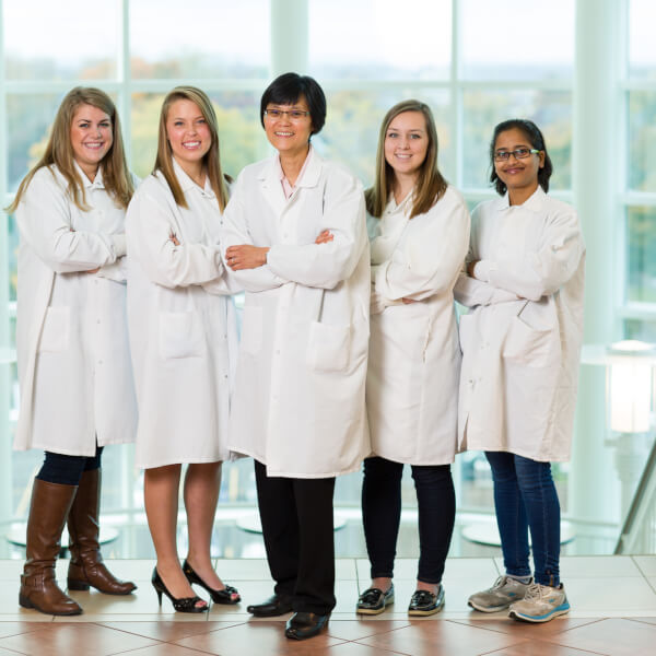 Photo by Amanda Pitts/  Sok Kean Khoo, center, is pictured with students, from left, Brooke Armistead, Emma Hahs, Sarah Brown and Sapana Shinde. They are studying biomarkers for Parkinson's and Alzheimer's diseases. 