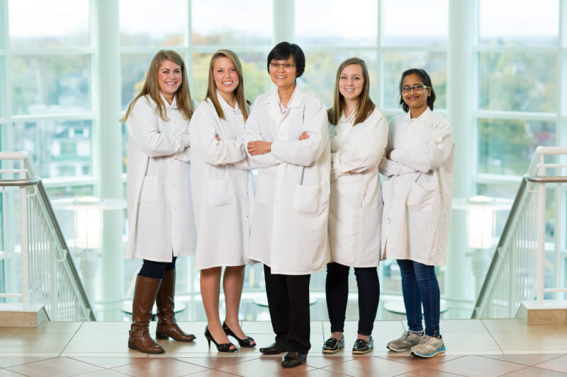 Photo by Amanda Pitts/  Sok Kean Khoo, center, is pictured with students, from left, Brooke Armistead, Emma Hahs, Sarah Brown and Sapana Shinde. They are studying biomarkers for Parkinson's and Alzheimer's diseases. 