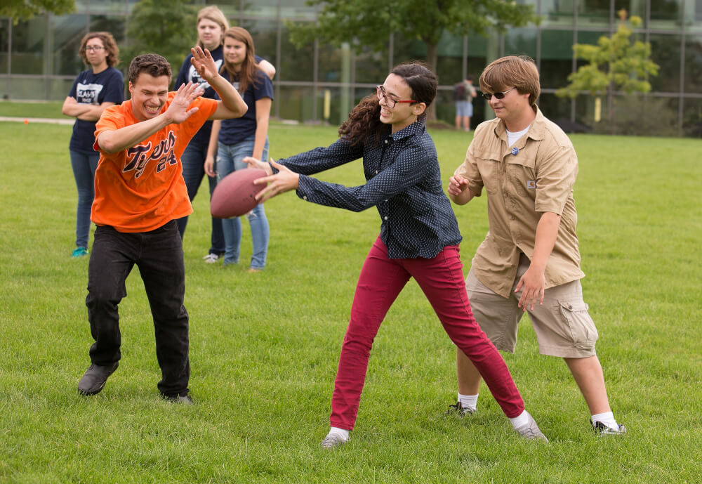 Students playing Medieval rugby. Photo by Rex Larsen