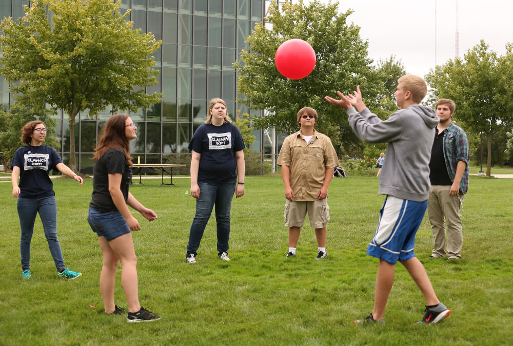 Students playing an ancient ball game. Photo by Rex Larsen